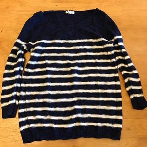 Navy blue and white striped sweater.